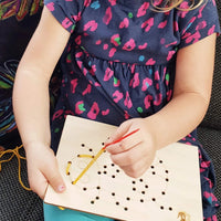 Wooden Sewing Kit with a Plastic Needle