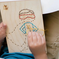 Wooden Sewing Kit with a Metallic Needle