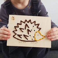 Wooden Sewing Kit with a Plastic Needle
